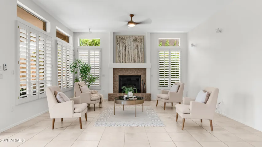 Elegant Living Anchored By Fireplace