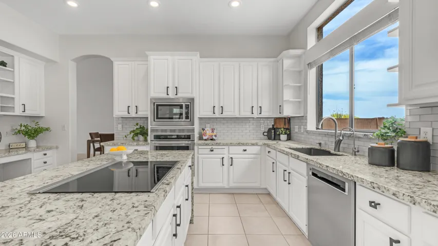 Refined Kitchen With Granite Surfaces