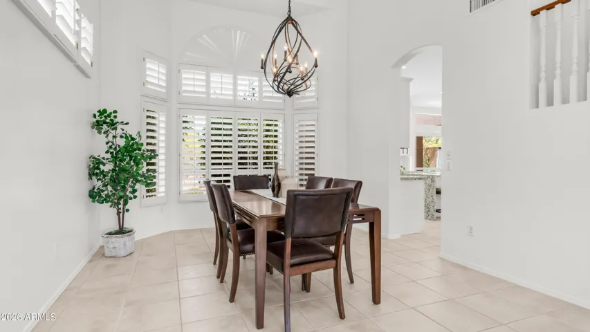 Formal Dining With Statement Lighting