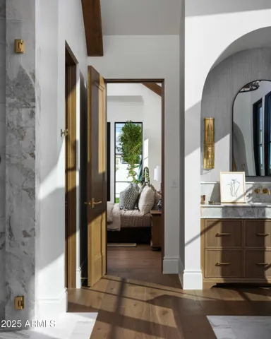 Double water closets, double vanities, expansive beautifully appointed shower, beverage bar with espresso machine, and a few more surprises waiting for you to find.