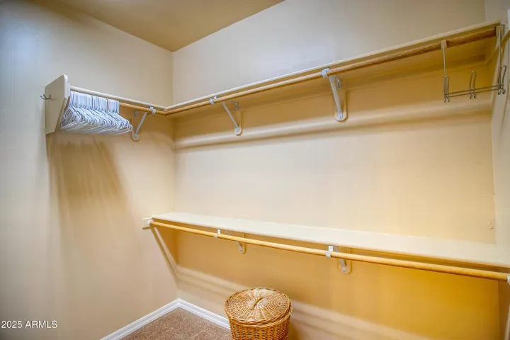 Photo is deceiving but this closet is LARGE! Tons of storage.