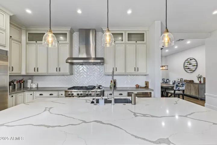 Large island provides "bar" seating and is just steps from the formal dining room