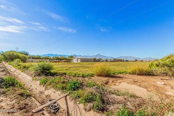 Approximate rear boundary of property along irrigation ditch.