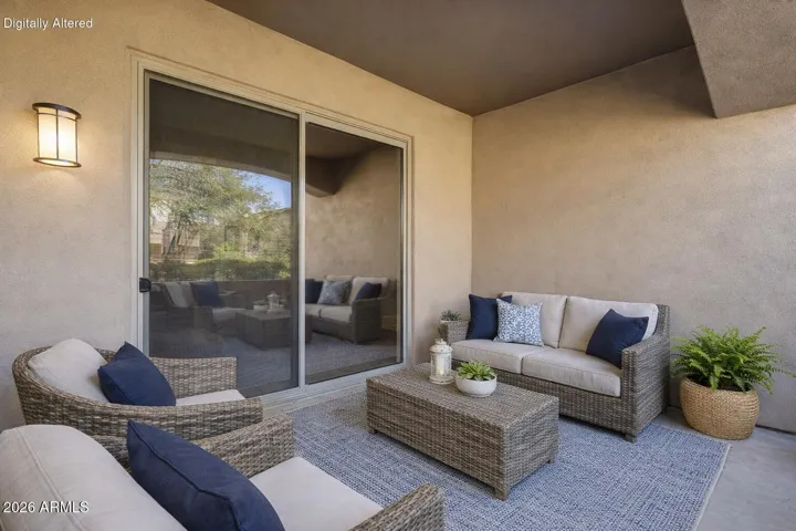 Virtually staged private patio off Primary Bedroom
