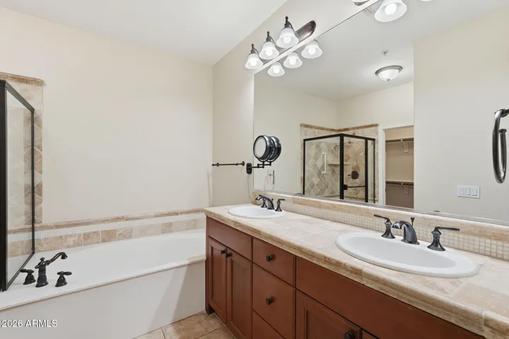 Dual sinks and separate soaking tub and shower