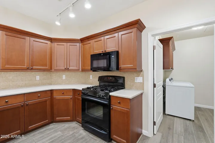 Laundry Room is off the Kitchen
