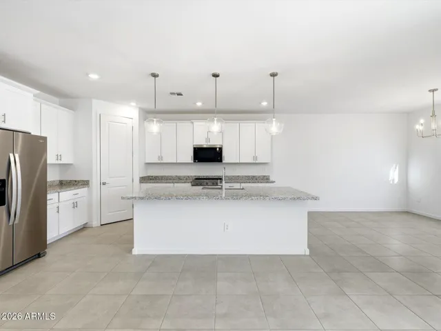 Photo is not of the actual home. Interior finishes and fixtures may vary