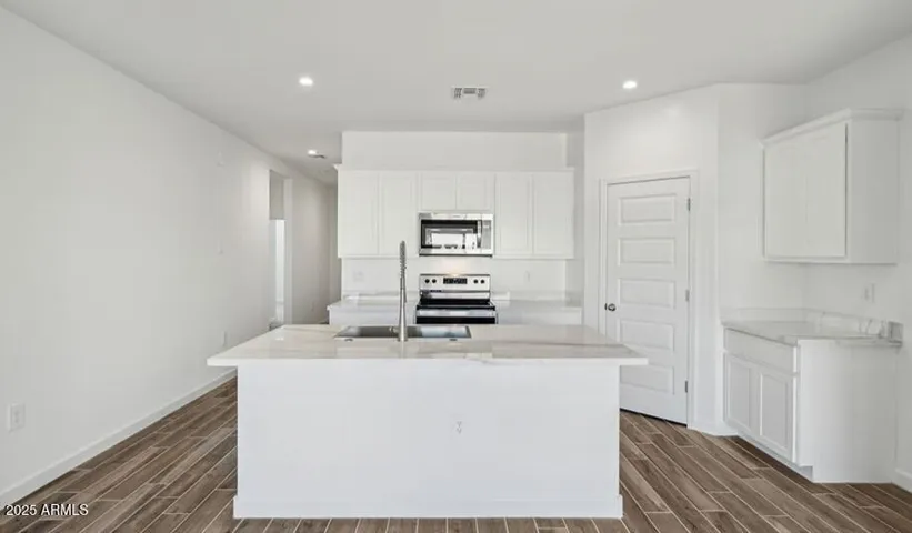Photos are of a spec and may vary in color, interior selections and design