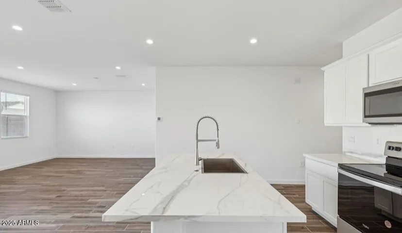 Photos are of a spec and may vary in color, interior selections and design