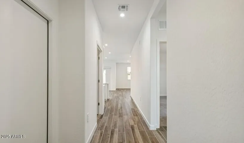 Photos are of a spec and may vary in color, interior selections and design