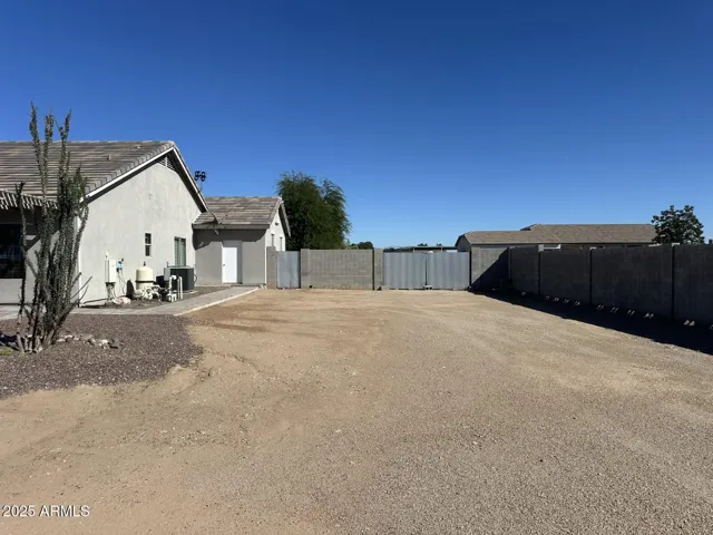 South side side yard - RV gate & pedestrian gate