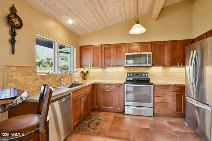 A well-designed and thoughtfully planned kitchen with direct access to the terrace. Fully equipped and highly functional, the space offers everything needed for comfortable everyday cooking while maintaining a practical and efficient layout.