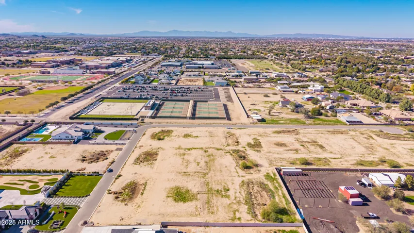 Casteel tennis courts and sand volleyball courts directly west of the lot