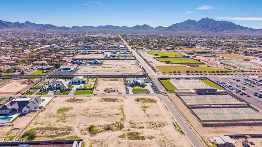 Casteel tennis courts and sand volleyball courts just west of the lot