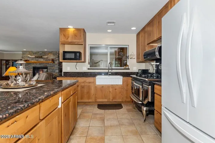 Farm sink, recently replaced appliances.