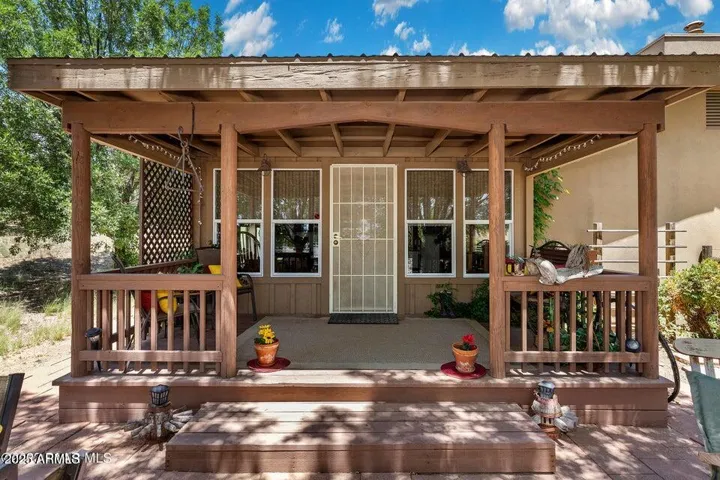 Second Covered Patio, shaded by the mature trees.