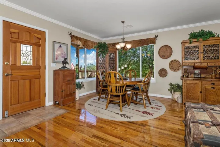 The hardwood floor carrys on throughout the main living space.