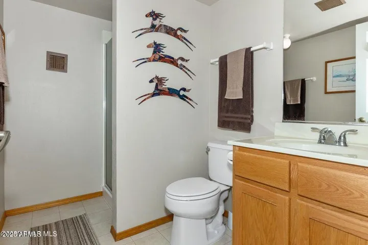 This 3/4 bath is off the garage, so convenient for the mechanic, gardener, tinkerer.