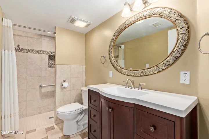 Downstairs Hall Bath with easy level-floor shower access