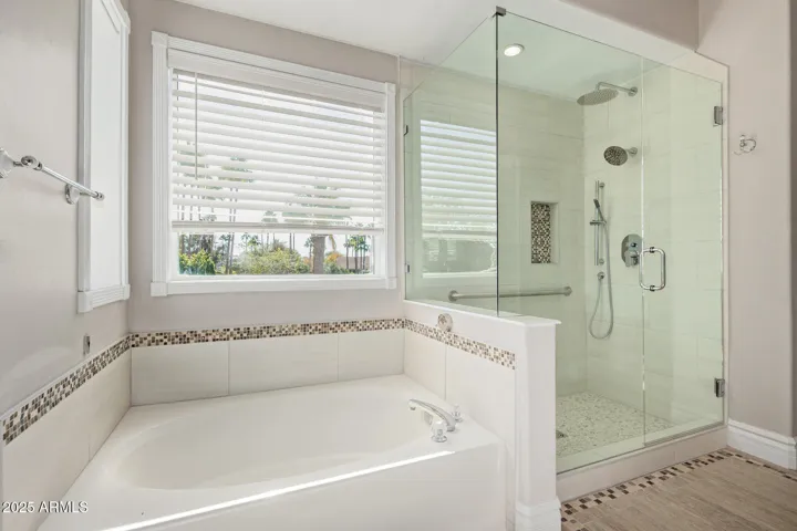 Recently remodeled with Floor to Ceiling Glass Shower Doors