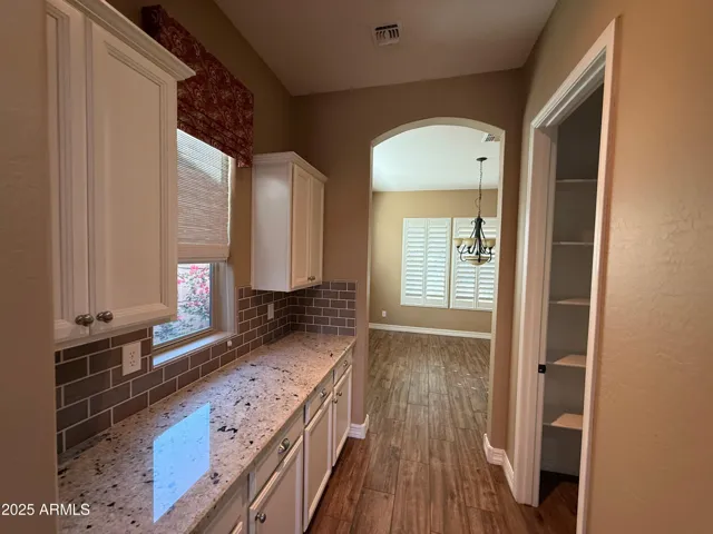 Extra Kitchen Counter/Cabinets with view of Dining Room