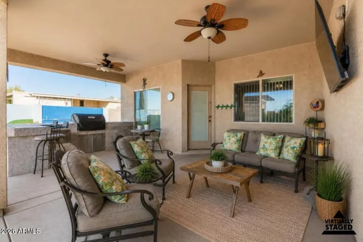 This photo has been virtually staged to add light staging to the space.