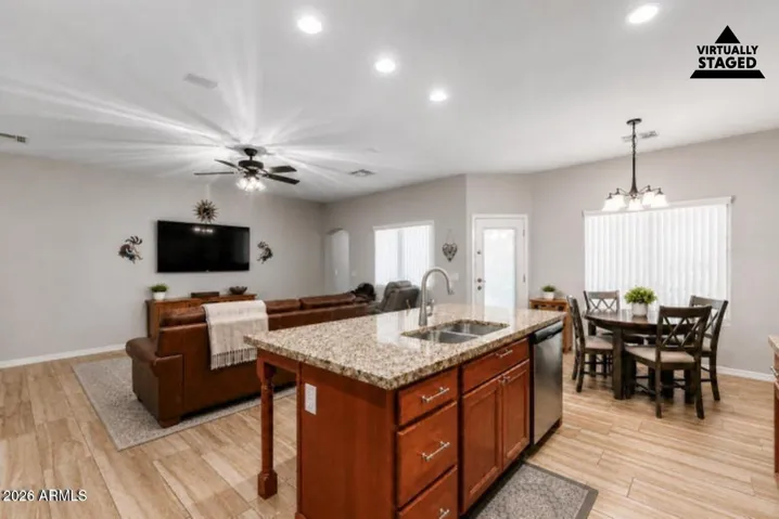 This photo has been virtually staged to add light staging to the space.