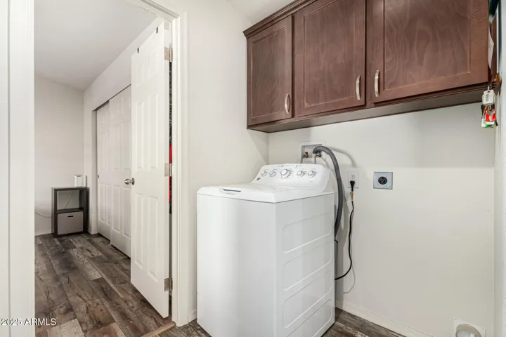 Laundry with cabinets