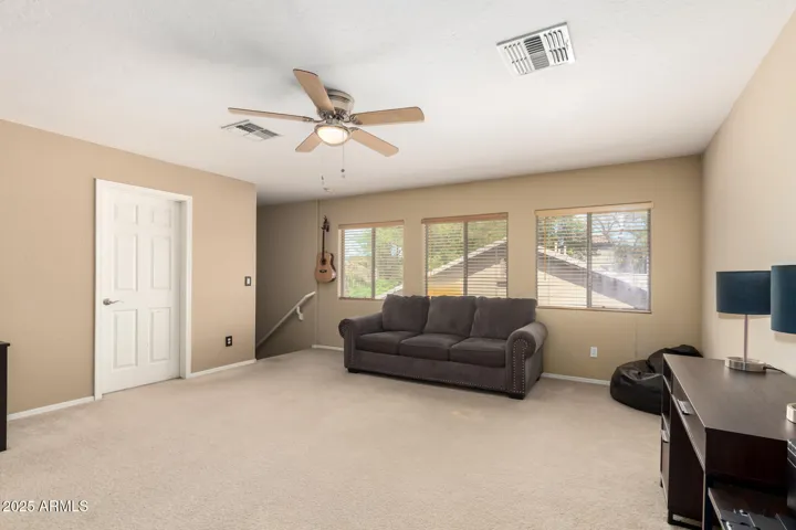 Upstairs loft and view of second staircase