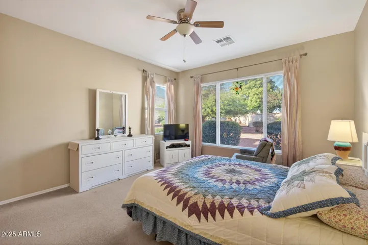 Your private retreat offers views of the back yard.