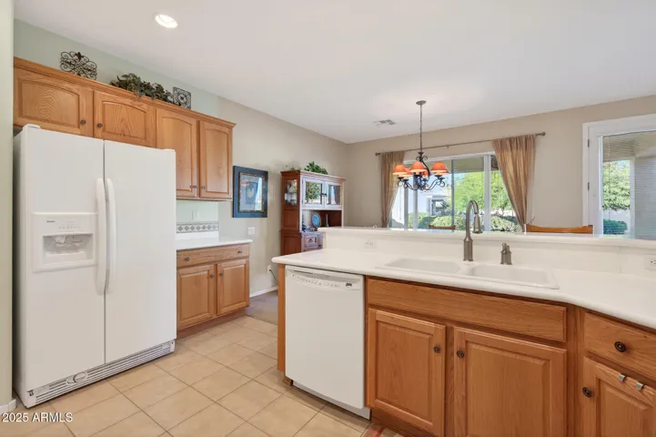 The kitchen is right off the dining room.