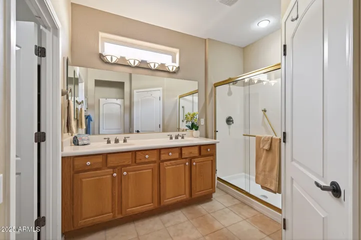Enjoy 2 sinks & a step in shower.