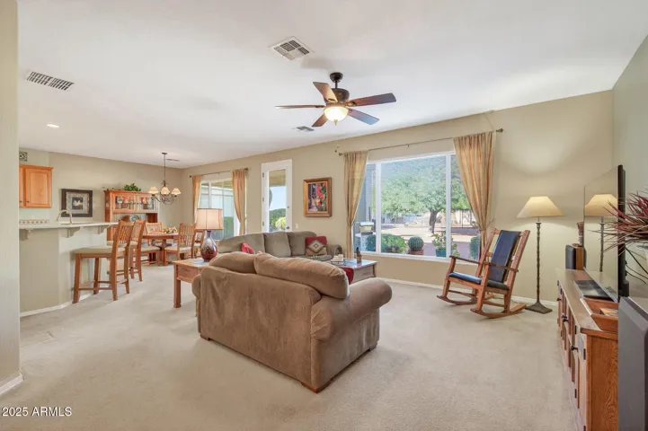 As you enter, you'll be greeted by the large Great Room.