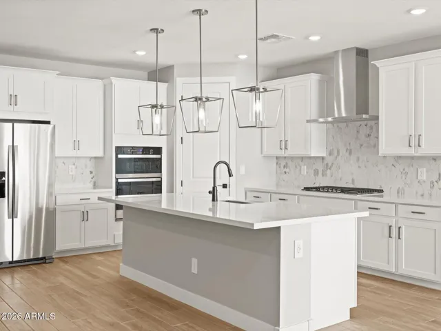 Photo is not of the actual home. Interior finishes and fixtures may vary