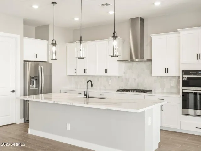 Photo is not of the actual home. Interior finishes and fixtures may vary