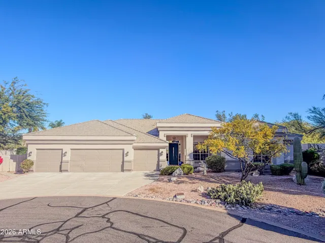Single level Scottsdale home with no stairs and 4 car garage!