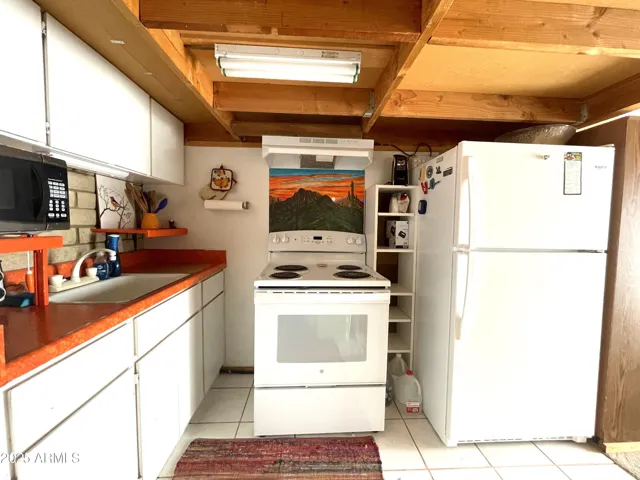Kitchen opens into living room