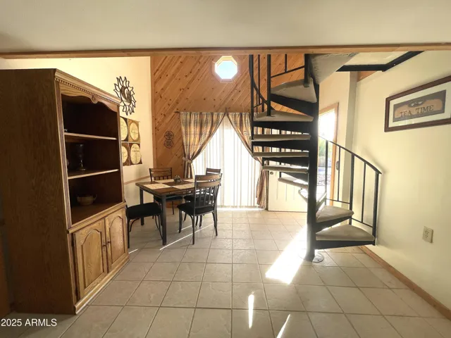 Stairway to the loft which seller is using as bedrooms three and four.