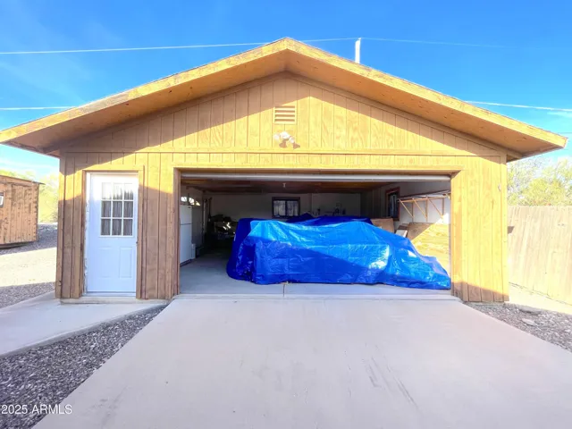 Access this garage two ways, off Donna Drive, or the alley. Very spacious with workbench and room to park vehicles, ATV, golf carts