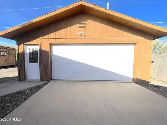 Slab parking in front of garge
