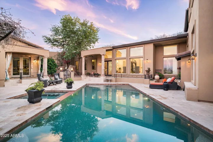 Backyard pool looking at house