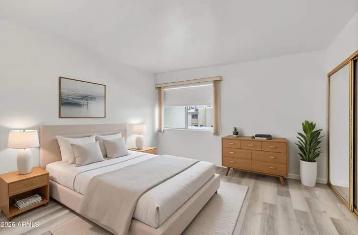 Upstairs secondary bedroom (virtually staged)