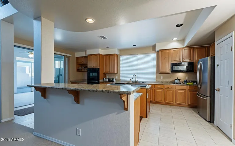 This photo is a rendering of what this space will look like once the home is vacant. This is virtually rendered via AI.