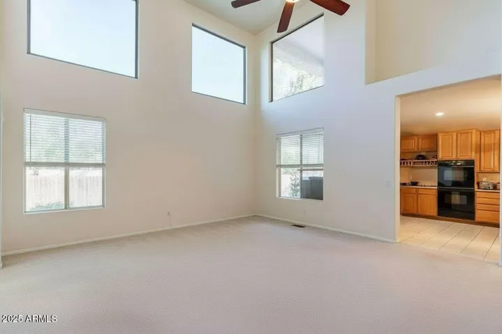 This photo is a rendering of what this space will look like once the home is vacant. This is virtually rendered via AI.