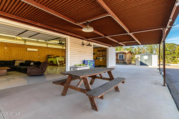 Indoor/outdoor living off 4 car garage