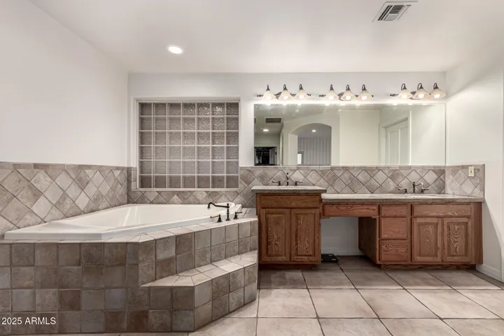 Huge Primary bathroom, with ample dual closets and plenty of space to create a masterpiece.