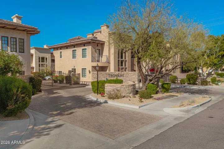 Experience the pinnacle of sophisticated living at Trovare, an exclusive gated enclave nestled in the prestigious Biltmore/Arcadia corridor.