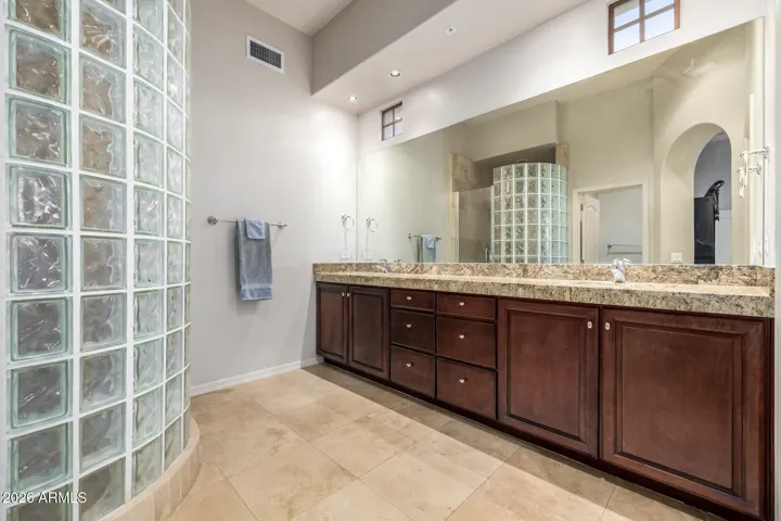 Dual sinks & granite countertops.