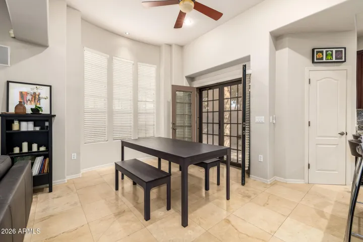 Open to the kitchen & living room with access via French doors to the backyard.