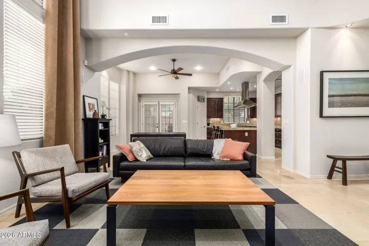 Expansive windows flood the space with natural light & frame serene views of your private surroundings.